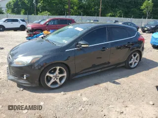 2014 Ford Focus Titanium with VIN 1FADP3N27EL251229, listed as a Copart auction lot 62201195 with 75,534 mi miles and Salvage title. Bid and sale history available at DreamBid. Image 1.
