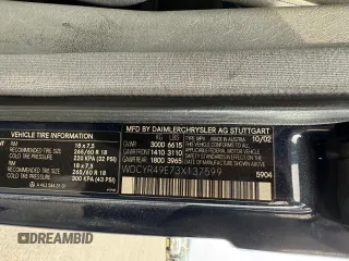 2003 Mercedes-Benz G 500 z VIN WDCYR49E73X137599, wystawiony jako Copart lot #56765315 z przebiegiem 157 409 mil mil oraz Tytuł czysty. Historia ofert i sprzedaży dostępna na DreamBid. Obrazek 10.