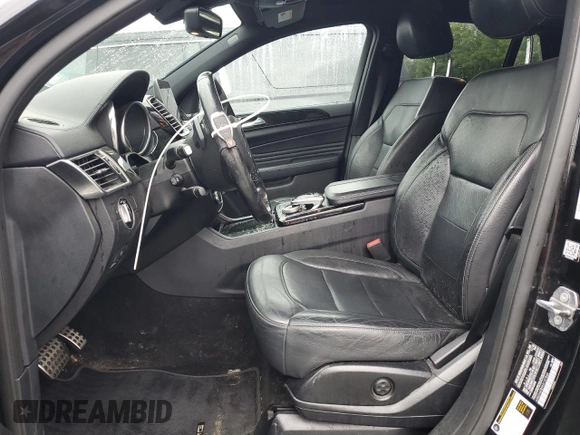 2019 Mercedes-Benz GLE 43 AMG with VIN 4JGED6EB5KA137564, listed as a Copart auction lot 57213595 with 104,144 mi miles and Salvage title. Bid and sale history available at DreamBid. Image 7.