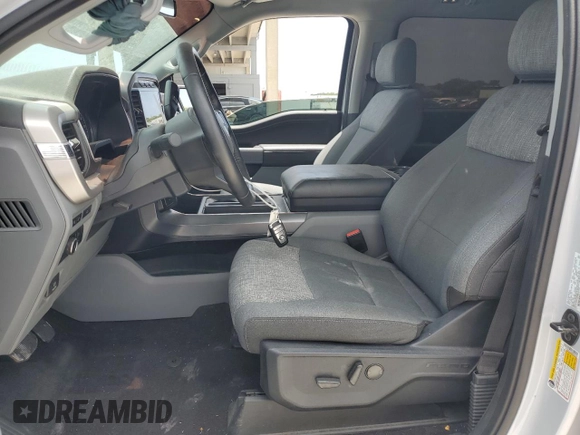 2021 Ford F-150 XL with VIN 1FTEW1CP2MKE62928, listed as a Copart auction lot 59882525 with 32,481 mi miles and Salvage title. Bid and sale history available at DreamBid. Image 7.