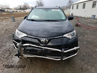 2018 Toyota RAV4 XLE with VIN 2T3RFREV6JW735352, listed as a Copart auction lot 46938025 with 73,229 mi miles and Salvage title. Bid and sale history available at DreamBid. Image 5.