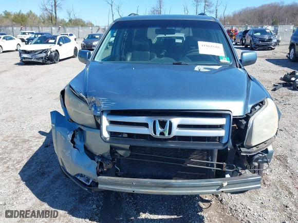 2006 Honda Pilot EX-L with RES with VIN 2HKYF18626H505792, listed as a IAAI auction lot 41861686 with 180,551 mi miles. Bid and sale history available at carsss.com. Image 12.