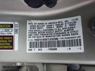 2007 Honda Civic Sdn LX with VIN 1HGFA16567L032980, listed as a IAAI auction lot 41171625 with 153,889 mi miles. Bid and sale history available at carsss.com. Image 9.