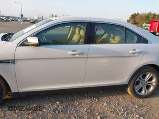 2015 Ford Taurus SEL with VIN 1FAHP2E82FG202143, listed as a IAAI auction lot 42053737 with 113,839 mi miles and . Bid and sale history available at carsss.com. Image 14.