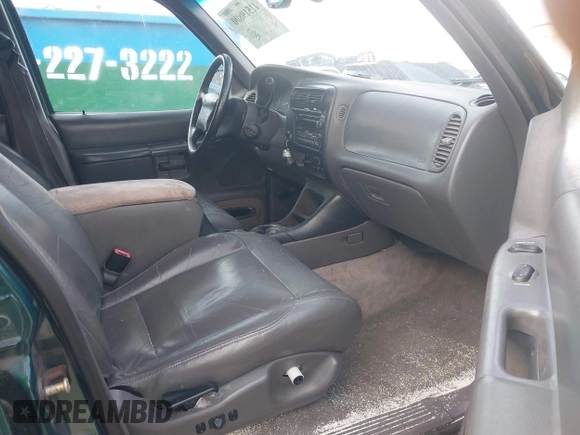1999 Ford Explorer XLT z VIN 1FMZU32E7XZB57306, wystawiony jako IAAI lot #41519800 z przebiegiem 226 932 mil mil oraz . Historia ofert i sprzedaży dostępna na DreamBid. Obrazek 5.