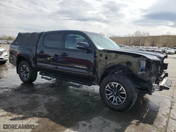 2020 Toyota Tacoma 4WD SR5 with VIN 3TMCZ5AN3LM332543, listed as a Copart auction lot 50872735 with 92,396 mi miles and Salvage Title. Bid and sale history available at carsss.com. Image 4.