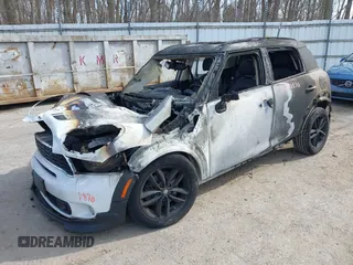 2014 MINI Countryman S with VIN WMWZC3C55EWT00416, listed as a IAAI auction lot 42031870 with Not Provided miles and . Bid and sale history available at DreamBid. Image 2.