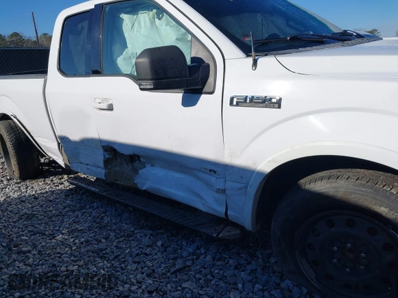 2015 Ford F-150 XL with VIN 1FTEX1CP2FKD90662, listed as a IAAI auction lot 41273874 with 138,768 mi miles. Bid and sale history available at carsss.com. Image 6.