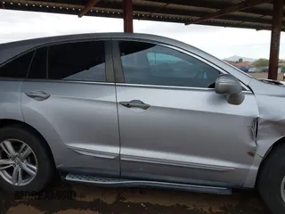 2014 Acura RDX Tech Pkg with VIN 5J8TB3H55EL004836, listed as a IAAI auction lot 41563096 with 124,373 mi miles. Bid and sale history available at carsss.com. Image 13.