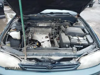 1996 Toyota Camry DX with VIN JT2BG12K5T0346311, listed as a IAAI auction lot 42130482 with 214,872 mi miles. Bid and sale history available at carsss.com. Image 10.