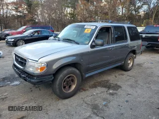 1999 Ford Explorer XLT z VIN 1FMZU32E4XUA16402, wystawiony jako Copart lot #85243074 z przebiegiem 148 110 mil mil oraz Szkody całkowita. Historia ofert i sprzedaży dostępna na DreamBid. Obrazek 1.