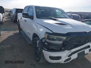 2023 Ram 1500 Laramie with VIN 1C6SRFJT7PN541092, listed as a IAAI auction lot 41808957 with 49,261 mi miles and . Bid and sale history available at DreamBid. Image 1.