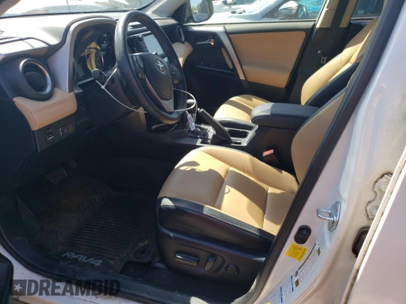 2016 Toyota RAV4 Limited z VIN JTMDJREVXGD058336, wystawiony jako Copart lot #54449295 z przebiegiem 108 837 mil mil oraz Szkoda całkowita • Salvage title. Historia ofert i sprzedaży dostępna na DreamBid. Obrazek 7.