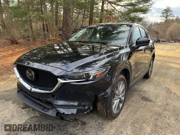 2020 Mazda CX-5 Grand Touring with VIN JM3KFADM8L0785373, listed as a Copart auction lot 50829175 with 135,736 mi miles and Clean Title. Bid and sale history available at DreamBid. Image 2.