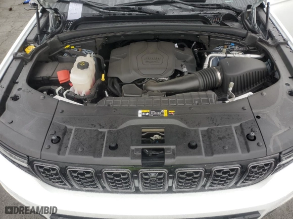 2023 Jeep Grand Cherokee L Summit with VIN 1C4RJKET9P8912883, listed as a Copart auction lot 84875984 with 8,487 mi miles and Salvage Title. Bid and sale history available at carsss.com. Image 12.