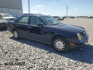 1998 Mercedes-Benz E with VIN WDBJF82F4WX012153, listed as a Copart auction lot 51848665 with 121,867 mi miles and Salvage Title. Bid and sale history available at DreamBid. Image 4.