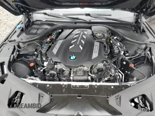 2024 BMW 8 Series M850i with VIN WBAGV8C00RCR84642, listed as a Copart auction lot 81367034 with 2,058 mi miles and Salvage Title. Bid and sale history available at carsss.com. Image 11.