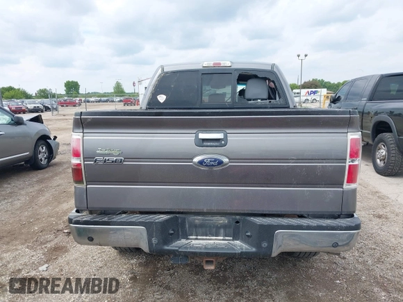 2014 Ford F-150 XL with VIN 1FTFW1ET4EKD59381, listed as a IAAI auction lot 42363671 with 303,429 mi miles and . Bid and sale history available at DreamBid. Image 16.
