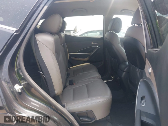 2017 Hyundai Santa Fe 2.4L with VIN 5NMZUDLBXHH022812, listed as a IAAI auction lot 42272430 with 76,121 mi miles and . Bid and sale history available at DreamBid. Image 8.