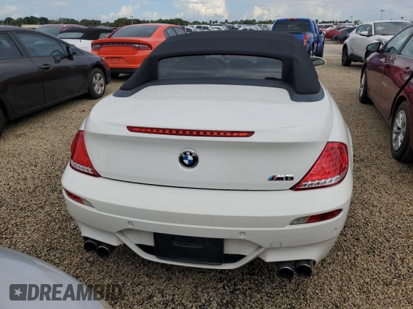 2008 BMW 6 Series M6 z VIN WBSEK93548CY79677, wystawiony jako Copart lot #74154364 z przebiegiem 109 352 mil mil oraz Szkoda całkowita • Salvage title. Historia ofert i sprzedaży dostępna na DreamBid. Obrazek 6.