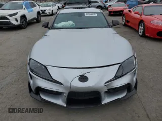 2021 Toyota GR Supra 3.0 with VIN WZ1DB0C0XMW039660, listed as a Copart auction lot 86909354 with 30,272 mi miles and Salvage Title. Bid and sale history available at carsss.com. Image 5.