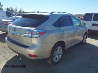 2011 Lexus RX 450h with VIN JTJBC1BAXB2420753, listed as a IAAI auction lot 41823358 with 102,714 mi miles and . Bid and sale history available at DreamBid. Image 4.