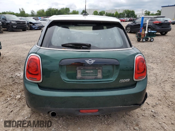 2019 MINI Hardtop 4 Door Cooper with VIN WMWXU1C51K2F82567, listed as a Copart auction lot 63321725 with 96,770 mi miles and Salvage title. Bid and sale history available at DreamBid. Image 6.