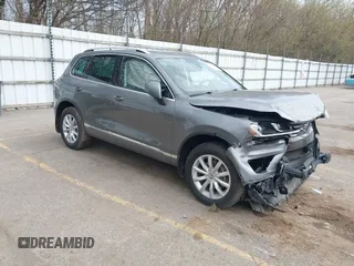 2016 Volkswagen Touareg Sport with VIN WVGEF9BPXGD012206, listed as a IAAI auction lot 42115314 with Not Provided miles and . Bid and sale history available at DreamBid. Image 1.