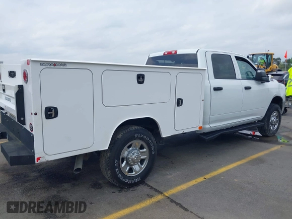 2024 Ram 2500 Tradesman with VIN 3C6UR5HJ1RG114588, listed as a IAAI auction lot 41923877 with 1,800 mi miles and . Bid and sale history available at DreamBid. Image 4.