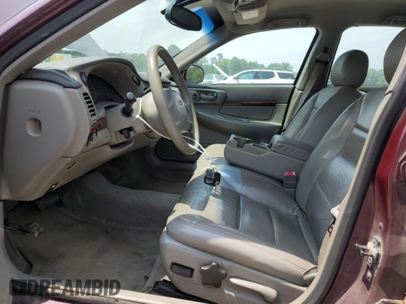 2004 Chevrolet Impala with VIN 2G1WF52E749123135, listed as a Copart auction lot 65401265 with 202,136 mi miles and Salvage title. Bid and sale history available at DreamBid. Image 7.
