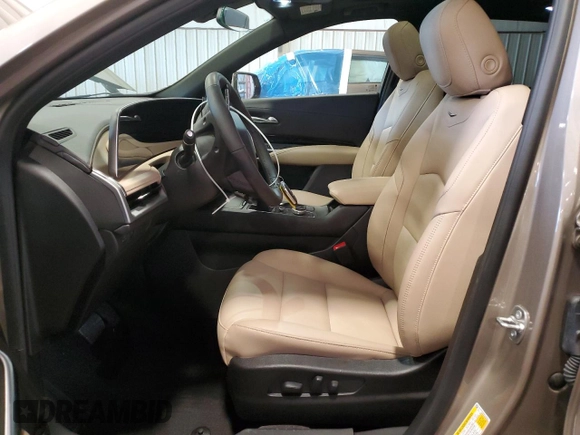 2024 Cadillac XT4 AWD Luxury with VIN 1GYFZBR48RF242850, listed as a Copart auction lot 52290865 with 1,524 mi miles and Salvage Title. Bid and sale history available at carsss.com. Image 7.