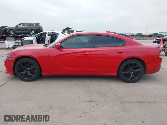 2015 Dodge Charger SXT z VIN 2C3CDXHG1FH901897, wystawiony jako IAAI lot #41795453 z przebiegiem 186 686 mil mil oraz . Historia ofert i sprzedaży dostępna na DreamBid. Obrazek 14.