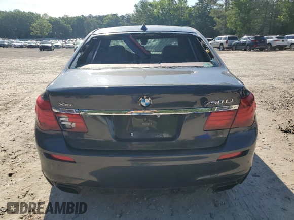 2013 BMW 7 Series 750Li xDrive with VIN WBAYF8C57DD140694, listed as a Copart auction lot 56983435 with 113,444 mi miles and Salvage title. Bid and sale history available at DreamBid. Image 6.