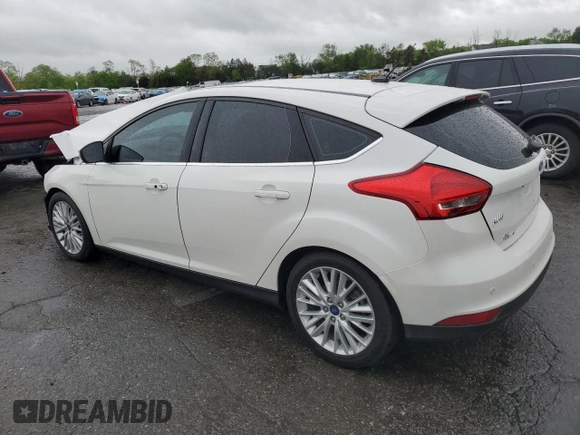 2017 Ford Focus Titanium с VIN 1FADP3N23HL244301, выставлен на аукционе Copart как лот 56625555 с пробегом 96 304 миль миль и Списание • Salvage title. История ставок и продаж доступна на DreamBid. Изображение 2.