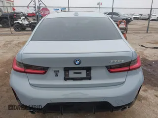 2023 BMW 3 Series 330e with VIN 3MW39FF00P8D57706, listed as a IAAI auction lot 41560259 with 1 mi miles. Bid and sale history available at carsss.com. Image 16.