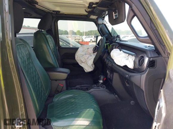 2023 Jeep Wrangler Willys with VIN 1C4HJXDG7PW646627, listed as a IAAI auction lot 42469601 with 50,178 mi miles and . Bid and sale history available at DreamBid. Image 5.