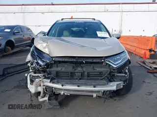 2017 Honda CR-V Touring with VIN 5J6RW2H99HL002127, listed as a IAAI auction lot 41517919 with 18,367 mi miles. Bid and sale history available at carsss.com. Image 13.