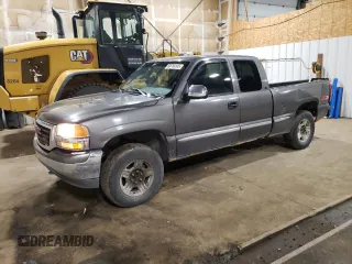 1999 GMC Sierra 1500 SLE z VIN 1GTEK19T4XZ519299, wystawiony jako Copart lot #60755345 z przebiegiem 237 361 mil mil oraz Czysty tytuł • Clean title. Historia ofert i sprzedaży dostępna na DreamBid. Obrazek 1.