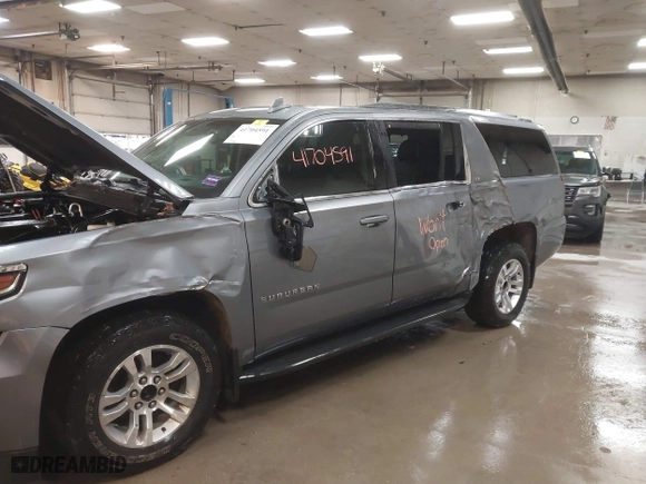 2019 Chevrolet Suburban LT with VIN 1GNSKHKC3KR195042, listed as a IAAI auction lot 41704591 with 107,166 mi miles. Bid and sale history available at carsss.com. Image 6.