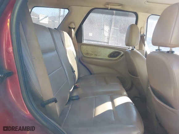 2005 Ford Escape Limited with VIN 1FMYU94135KC22117, listed as a IAAI auction lot 41441590 with 238,811 mi miles. Bid and sale history available at carsss.com. Image 8.