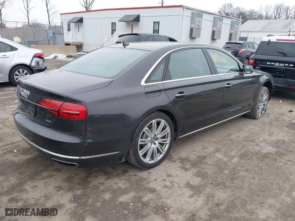 2016 Audi A8 L 3.0T with VIN WAU34AFD7GN008348, listed as a IAAI auction lot 41352817 with 105,762 mi miles. Bid and sale history available at carsss.com. Image 4.