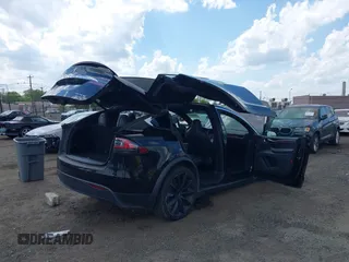 2019 Tesla Model X 75D with VIN 5YJXCBE21KF180203, listed as a IAAI auction lot 42190255 with 114,294 mi miles and . Bid and sale history available at carsss.com. Image 21.