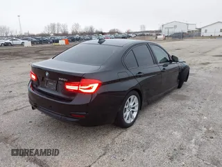 2018 BMW 3 Series 320i with VIN WBA8E1G56JNU91008, listed as a IAAI auction lot 41247490 with 57,434 mi miles. Bid and sale history available at carsss.com. Image 4.