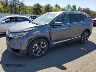 2019 Honda CR-V Touring with VIN 7FARW1H97KE001010, listed as a Copart auction lot 57523475 with 137,545 mi miles and Clean title. Bid and sale history available at DreamBid. Image 1.