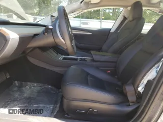 2023 Tesla Model 3 with VIN 5YJ3E1EA1PF664941, listed as a Copart auction lot 58097005 with 39,391 mi miles and Salvage title. Bid and sale history available at DreamBid. Image 7.