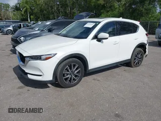 2018 Mazda CX-5 Grand Touring with VIN JM3KFBDM6J0451605, listed as a IAAI auction lot 42099182 with 81,703 mi miles and . Bid and sale history available at DreamBid. Image 17.