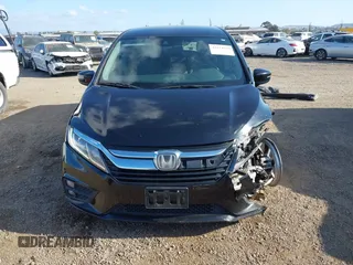 2019 Honda Odyssey EX with VIN 5FNRL6H54KB036540, listed as a IAAI auction lot 42124939 with 135,417 mi miles. Bid and sale history available at carsss.com. Image 13.