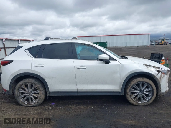 2019 Mazda CX-5 Grand Touring with VIN JM3KFBDM9K0697467, listed as a IAAI auction lot 41940364 with 62,015 mi miles. Bid and sale history available at carsss.com. Image 14.