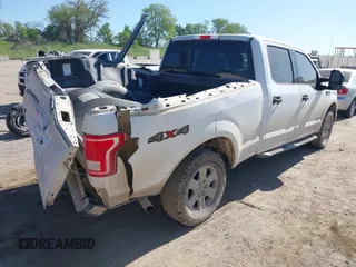 2017 Ford F-150 XL with VIN 1FTFW1EG4HKD98317, listed as a IAAI auction lot 42238325 with 124,494 mi miles and . Bid and sale history available at DreamBid. Image 4.