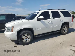 2014 Chevrolet Tahoe LS with VIN 1GNSCAE08ER148213, listed as a Copart auction lot 58451015 with 140,470 mi miles and Salvage title. Bid and sale history available at DreamBid. Image 1.